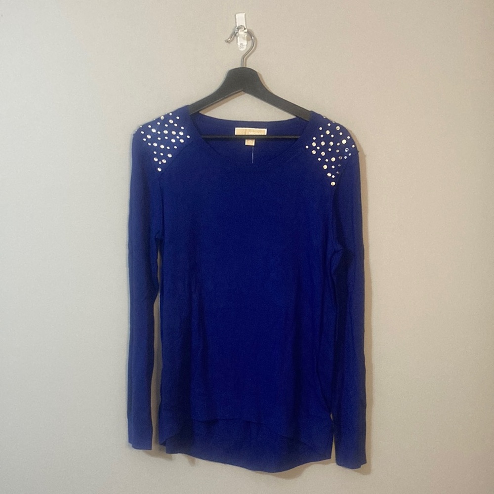 Micheal Kors blue light weight sweater top with jewels on shoulder.
